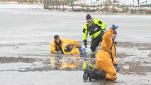Boston firefighters training for icy water rescues in Fenway on Tuesday, Jan. 23, 2024.