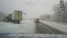A jack-knifed truck on Interstate 95 on Sunday, Jan. 7, 2024, as a snowstorm hit Massachusetts.