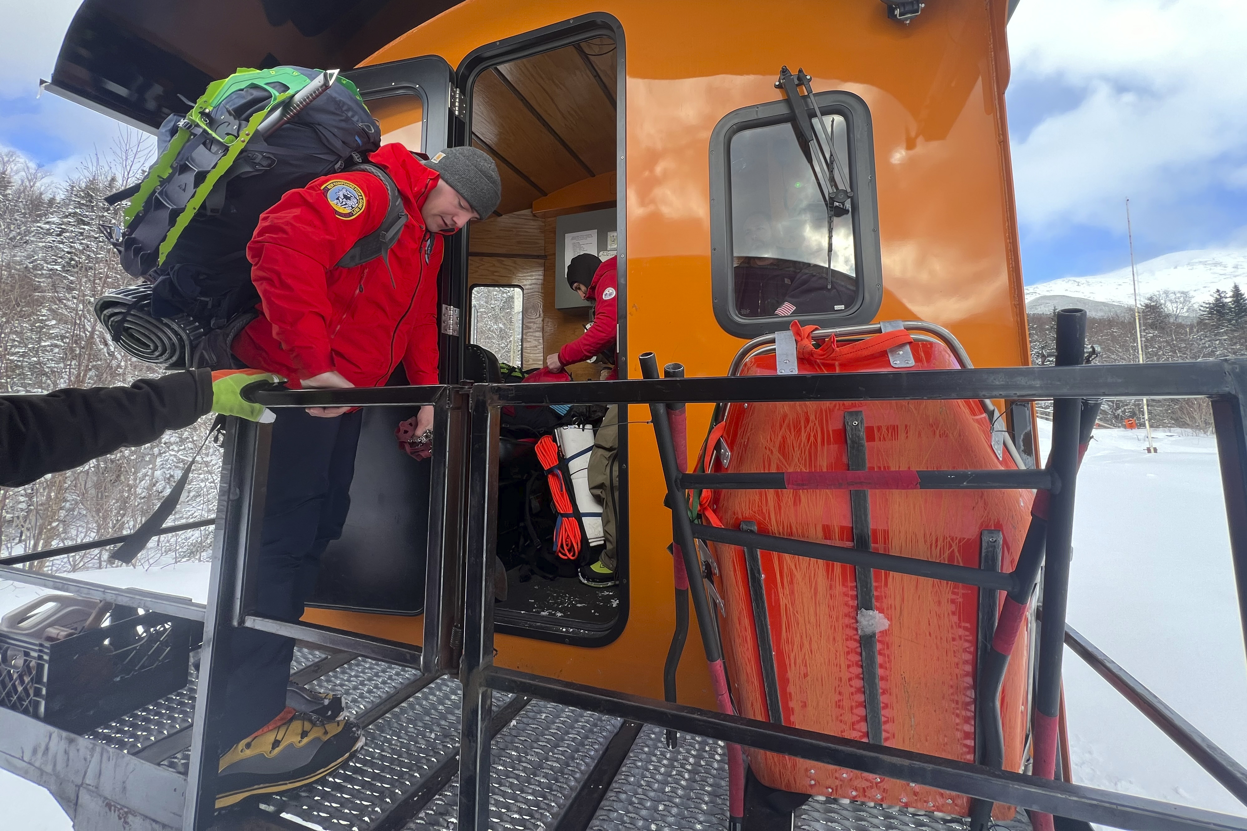 New Hampshire Fish and Game conservation officer Brad Jones prepares to set out on a rescue mission at the Cog Railway base station.