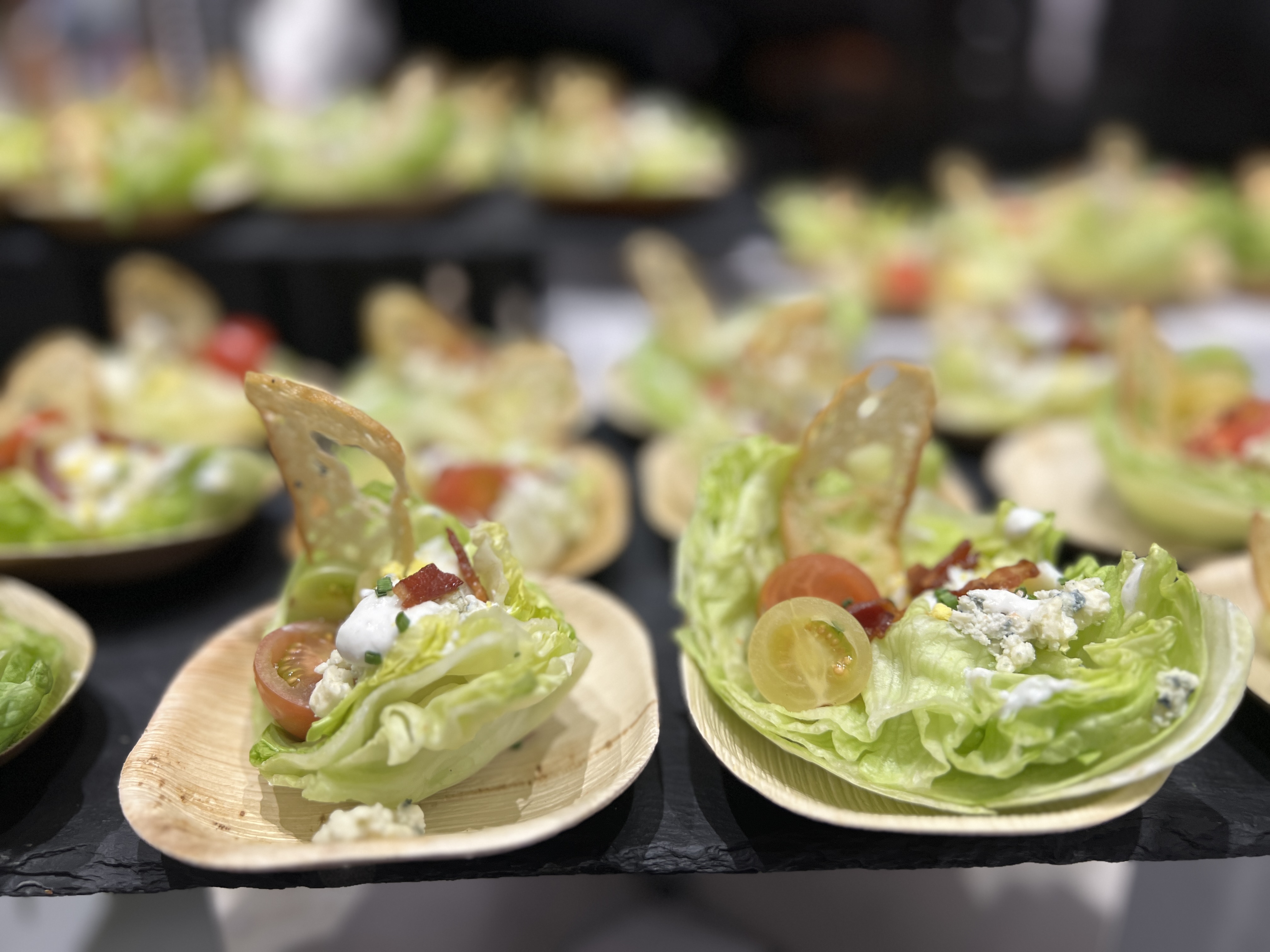 A wedge of Vegas salad: Smoked bacon, blue cheese, baby heirloom tomatoes, and buttermilk dressing.