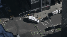 An ambulance outside the Moxy Hotel in Boston's Downtown Crossing on Monday, Feb. 26, 2024, amid a death investigation.