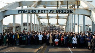 U.S. Vice President Kamala Harris, front center, other participants walk over the Edmund Pettus Bridge during an event marking the 57th anniversary of the 1965 Bloody Sunday civil rights march in Selma, Alabama, U.S., on Sunday, March 6, 2022.