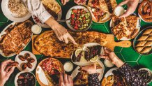 Muslim Ramadan iftar dinner of dates, dolma, kebab, flatbread, pide, borek, sweets and salad.