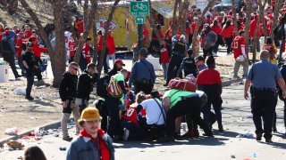 File - Law enforcement and medical personnel respond to a shooting at Union Station during the Super Bowl LVIII victory parade on Feb. 14, 2024, in Kansas City.