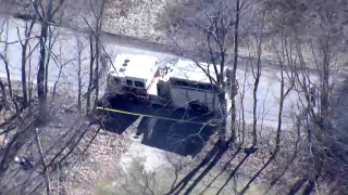 First responders near where a woman was found unresponsive in Ashby, Massachusetts, on Thursday, March 14, 2024. The woman was later pronounced dead.
