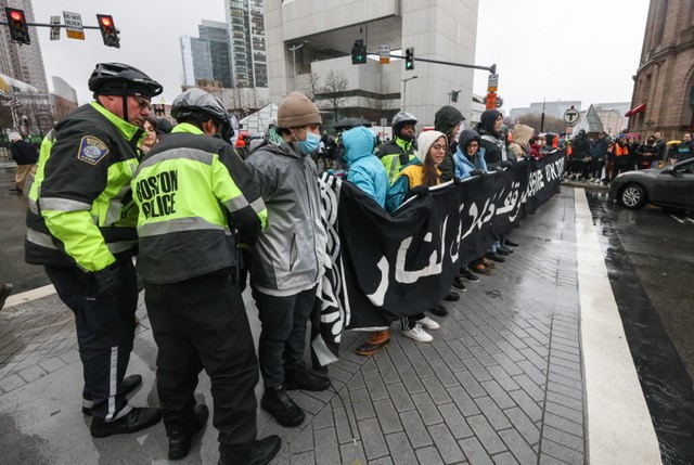 Police make arrests during a pro-Palestinian demonstration that disrupted traffic outside Boston's South Station on Thursday, March 7, 2024.
