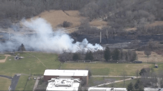 Smoke rising over Massasoit Community College in Brockton, Massachusetts, on Friday, March 22, 2024.