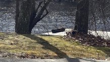 A cylindrical tank pulled from the Charles River in Needham, Massachusetts, amid a police search for unexploded ordnance on Monday, March 11, 2024.