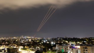 An anti-missile system operates after Iran launched drones and missiles towards Israel, as seen from Ashkelon, Israel April 14, 2024. 