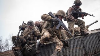 Ukrainian servicemen practice combat drills involving a BMP-1 in Donbas, Ukraine as Russia-Ukraine war continues on March 19, 2024. 