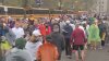 Runners prepare to head to the Boston Marathon starting line