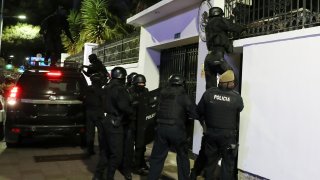 Police raid Mexico Embassy in Quito, Ecuador.