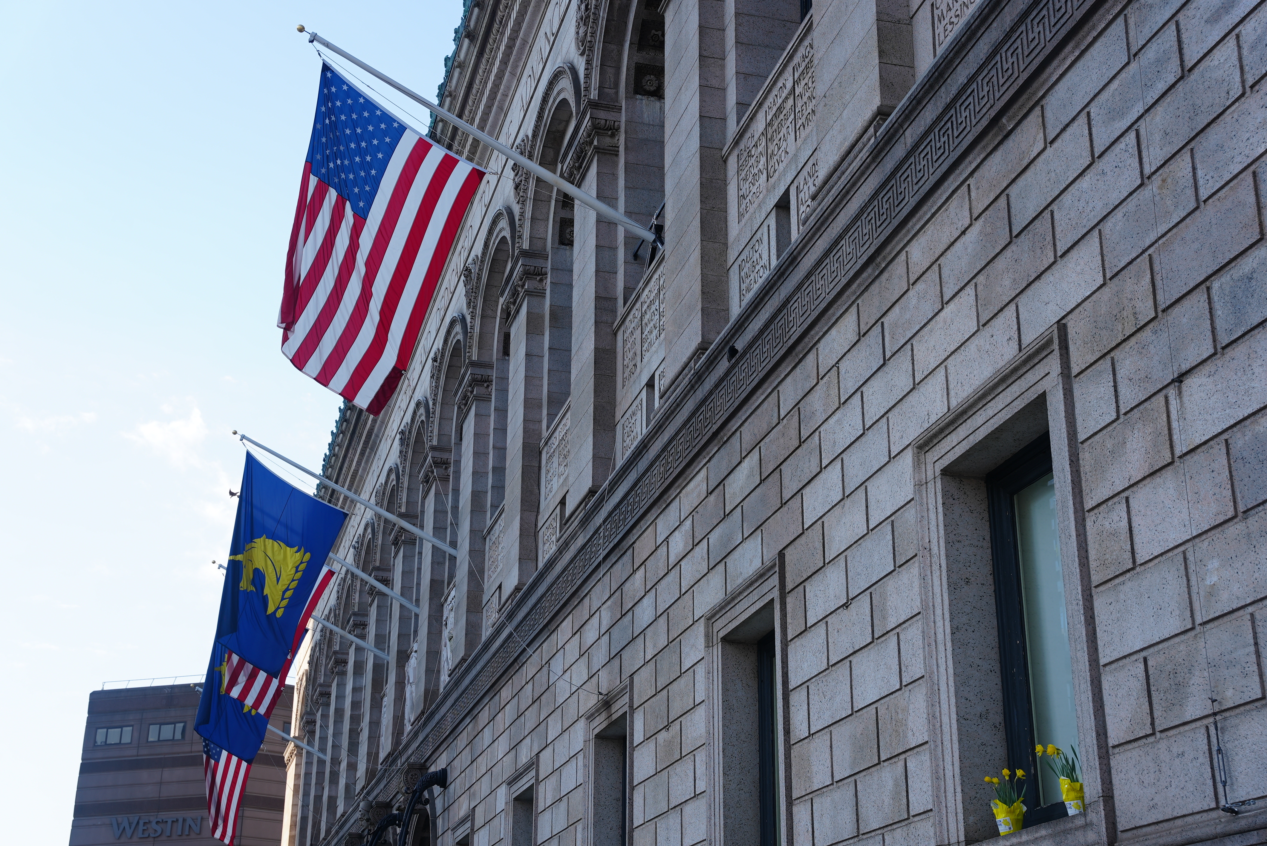 The Boston Athletic Association’s unicorn flag hanging outside the Boston Public Library in Copley Square on Marathon  Monday, April 15, 2024.