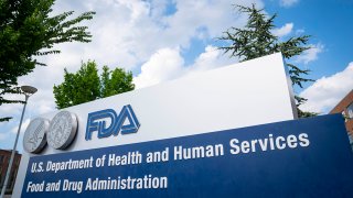 FILE - A sign outside the Food and Drug Administration headquarters in White Oak, Maryland, July 20, 2020.