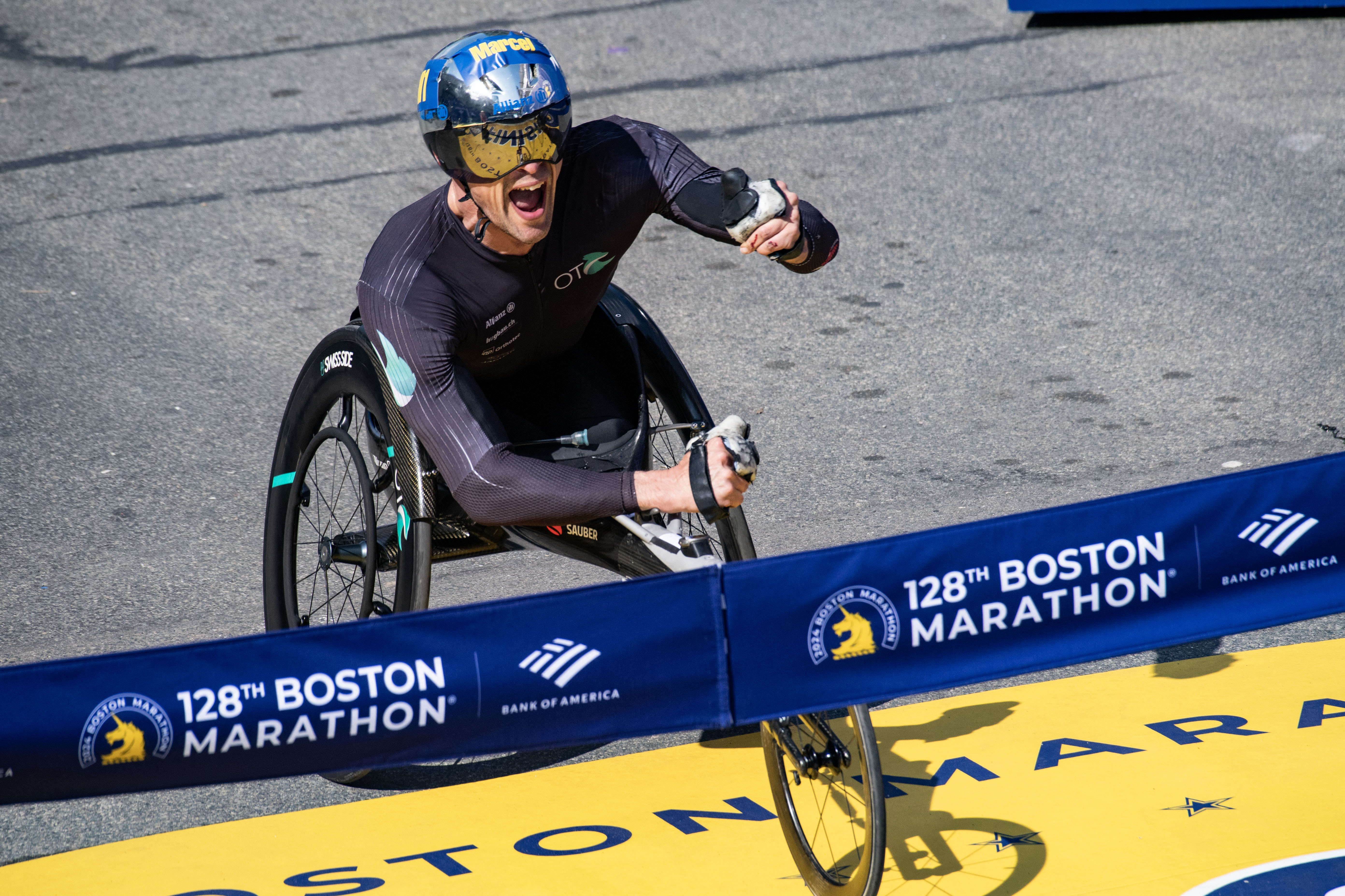 Swiss athlete Marcel Hug takes first place in the men’s wheelchair professional field in the 128th Boston Marathon on Monday, April 15, 2024.