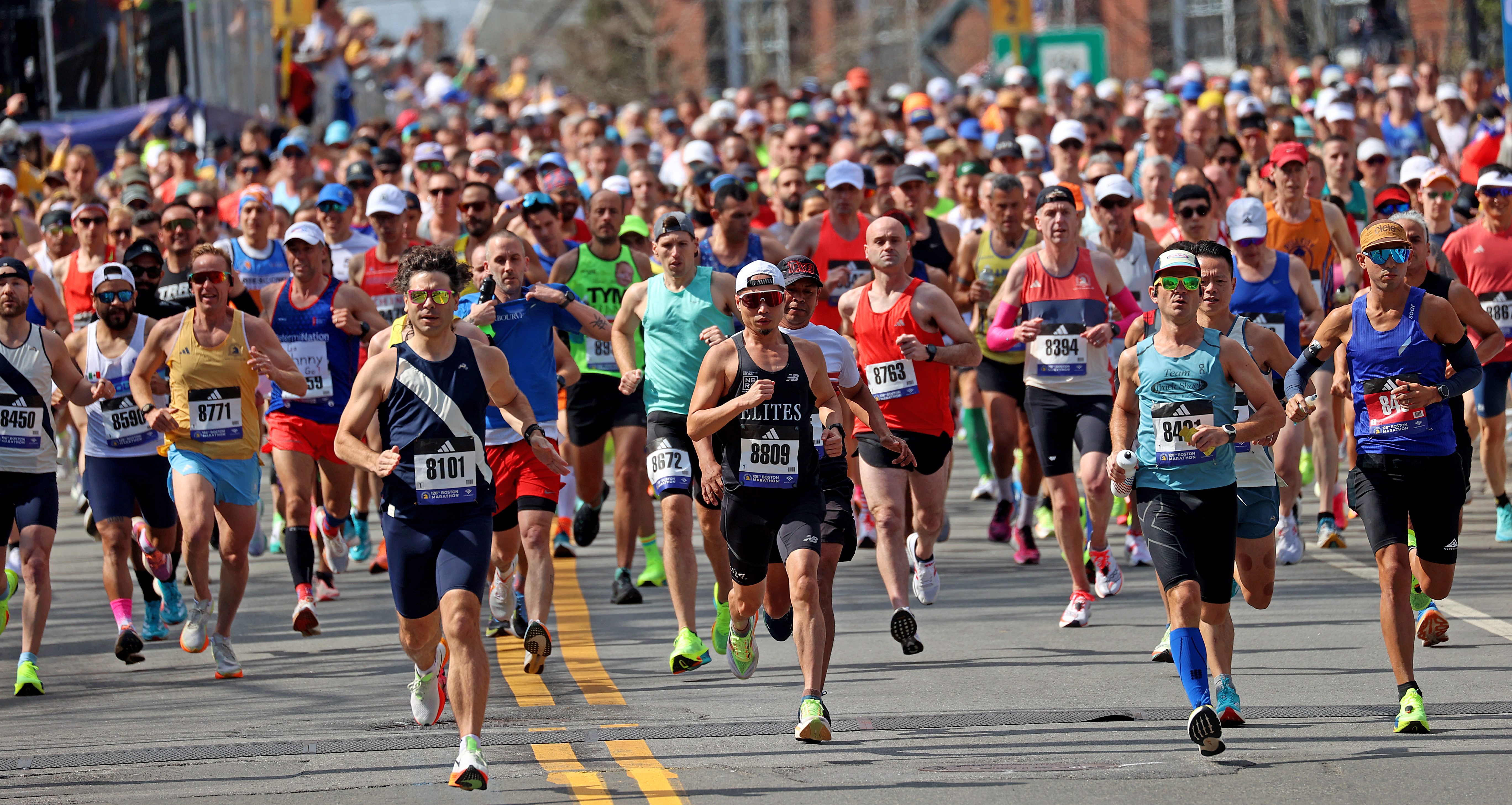 Runners take off at the start of the 128th Boston Marathon.