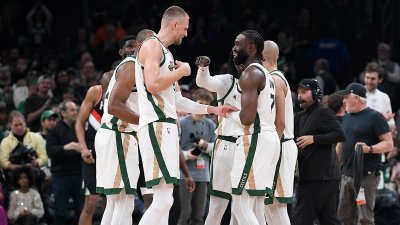 Celtics teammates Kristaps Porzingis and Jaylen Brown