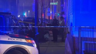 Boston police investigate a shooting at W 7th and D streets Thursday night.