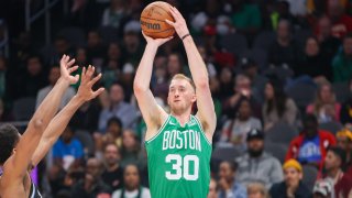 Mar 25, 2024; Atlanta, Georgia, USA; Boston Celtics forward Sam Hauser (30) shoots against the Atlanta Hawks in the second quarter at State Farm Arena. Mandatory Credit: Brett Davis-USA TODAY Sports