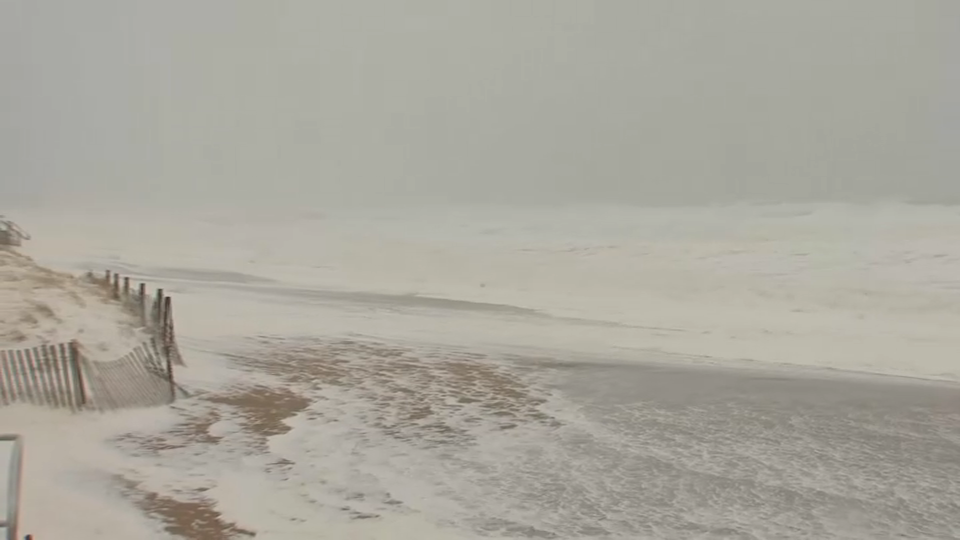 Sea foam covers the beach in Salisbury, Massachusetts, amid a storm on Thursday, April 4, 2024.