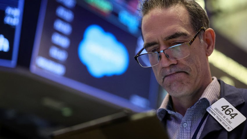 Traders work on the floor at the New York Stock Exchange on March 5, 2024.