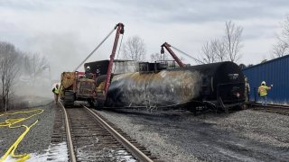 Officials continue to conduct operation and inspect the area after the train derailment in East Palestine, Ohio, United States on February 17, 2023.