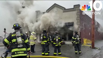 Fire destroys former tux shop in Chelsea