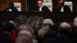 Presiding Judge Nawaf Salam reads the ruling of the International Court of Justice, or World Court, in The Hague, Netherlands, Friday, May 24, 2024.