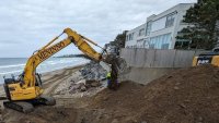Humpback whale buried after washing ashore in Swampscott