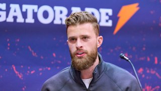 Harrison Butker #7 of the Kansas City Chiefs speaks to media during Super Bowl LVIII Opening Nigh