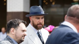 Kansas City Chiefs tight end Travis Kelce, middle, boyfriend to superstar pop artist Taylor Swift, is seen at the 150th Kentucky Derby