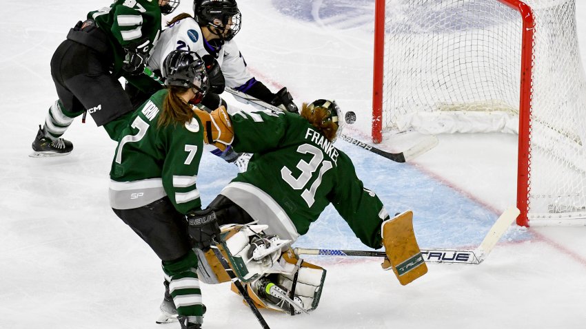 Liz Schepers #21 of Minnesota scores on Aerin Frankel #31 of Boston in the second period of Game 5 of the PWHL Finals at Tsongas Center on May 29, 2024 in Lowell, Massachusetts.