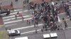 Pro-Palestinian protesters block Mass. Ave near MIT as schools threaten suspensions