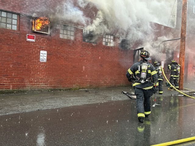 Firefighters battling a building fire in Chelsea, Massachusetts, on Thursday, May 30, 2024.