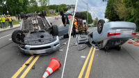 Car flips in front of Norwood middle school