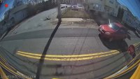 Video captures car speeding by stopped bus just after kids crossed street in Peabody