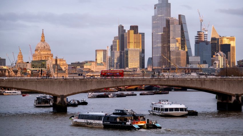 City of London skyline view looking over the River Thames and Waterloo Bridge at sunset on 10th February 2024 in London, United Kingdom.