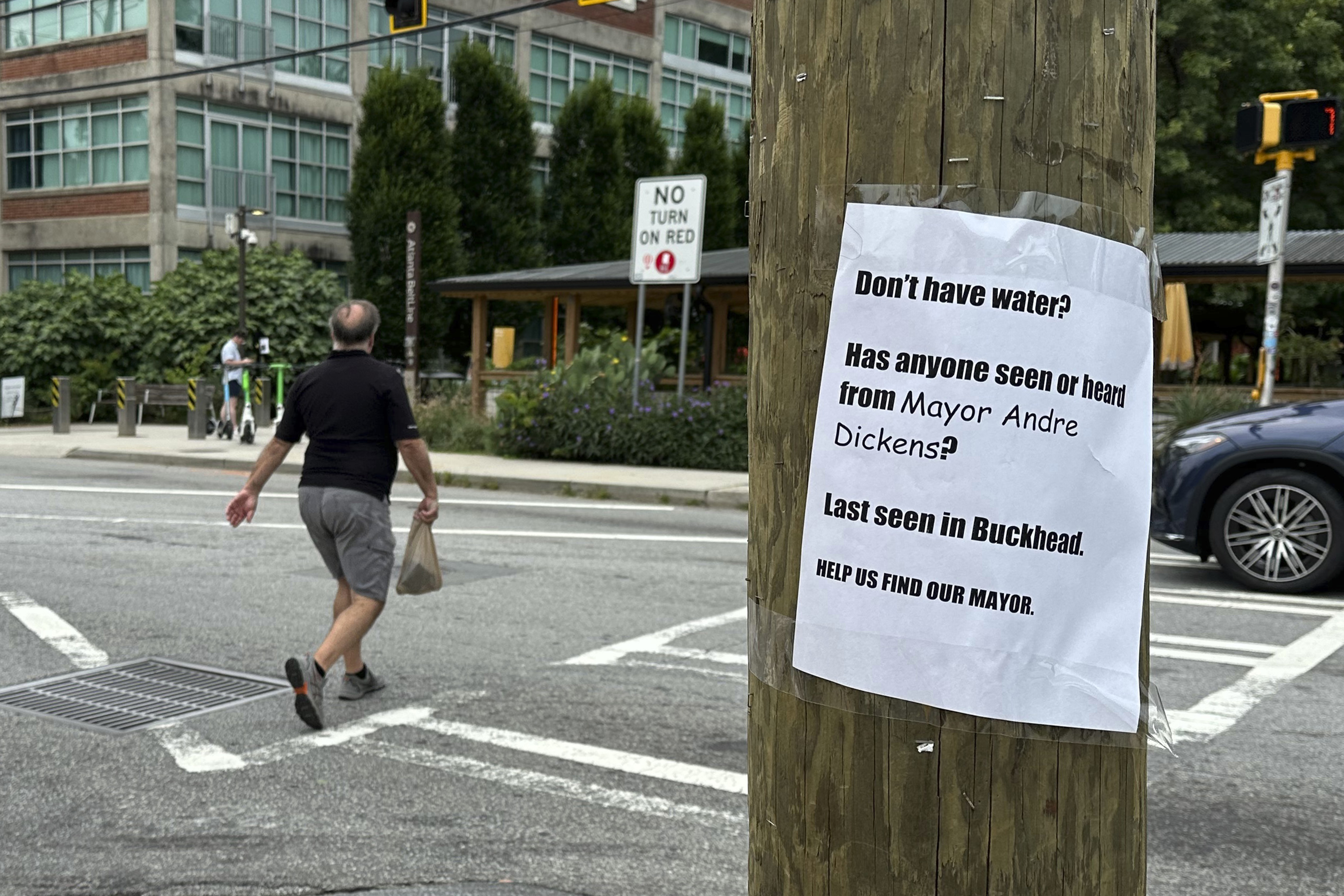 A sign expressing frustration with the city of Atlanta's response after corroding water pipes