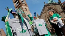 A fan browses souvenirs in Copley Square before the Celtics championship celebration parade through the city.