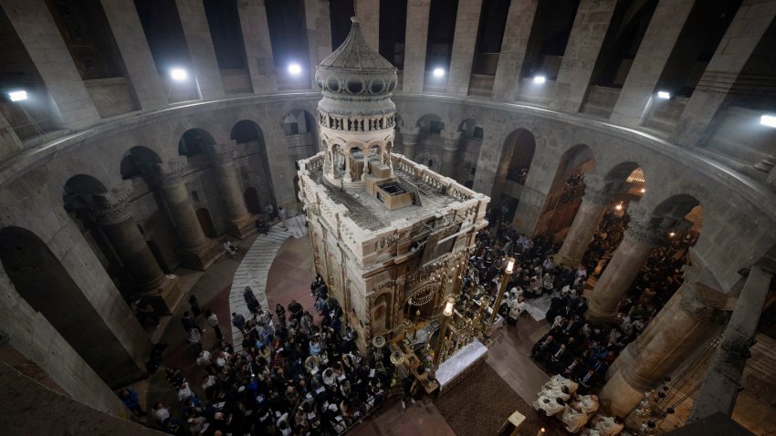 FILE - Latin Patriarch of Jerusalem Pierbattista Pizzaballa leads the Easter Sunday Mass at the Church of the Holy Sepulchre, where many Christians believe Jesus was crucified, buried and rose from the dead, in the Old City of Jerusalem, Sunday, March 31, 2024. The heads of major Christian denominations in Israel say that local governments across the country are demanding they pay property tax, violating a longstanding arrangement in a manner they say reflects growing intolerance for Christians in the Holy Land.