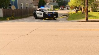 The scene on Russell Avenue in Auburn, Maine after a police shooting early Saturday.