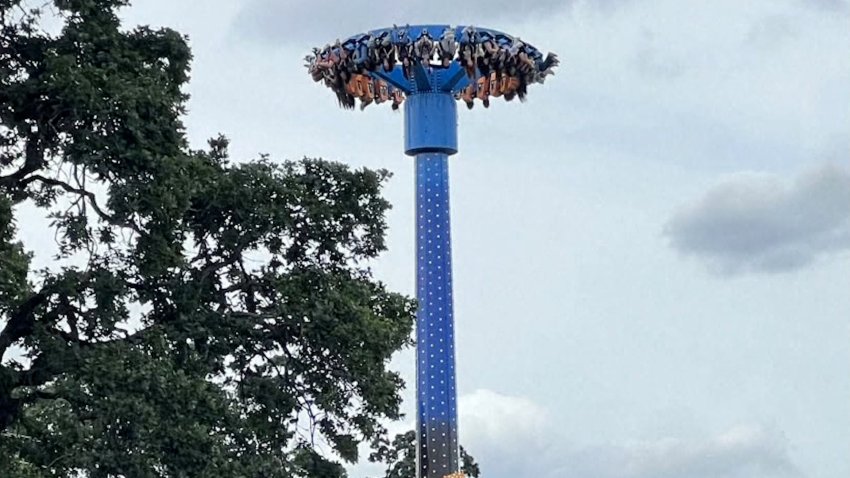 Riders stuck upside down on an amusement park ride