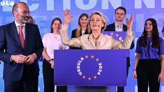 President of the centre-right European People's Party (EPP) Manfred Weber (L) looks at as European Commission President and EPP lead candidate Ursula von der Leyen