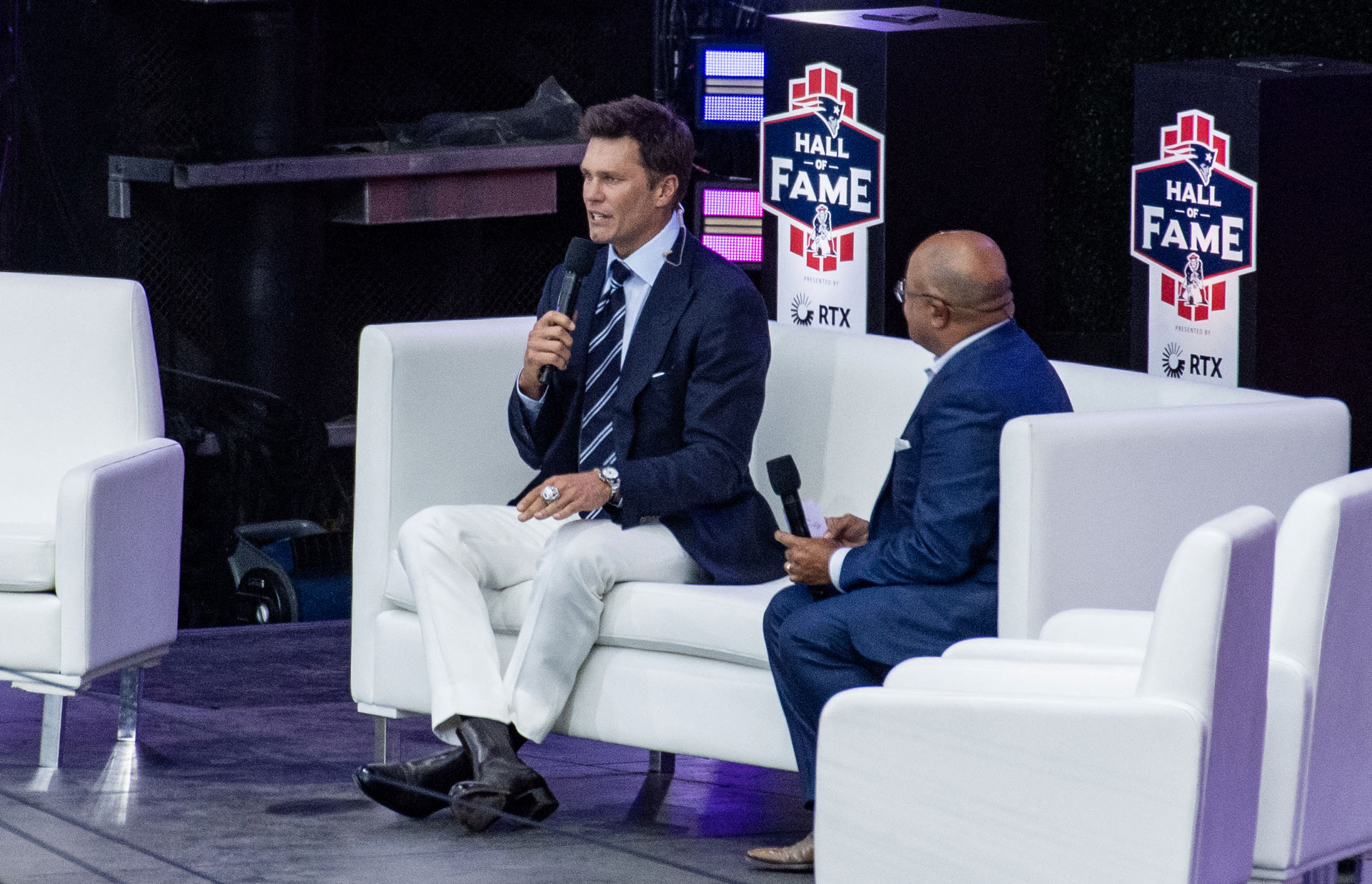 Former New England Patriots quarterback Tom Brady speaks on stage during his 2024 Hall of Fame induction ceremony at Gillette Stadium in Foxborough, Massachusetts, on June 12, 2024.