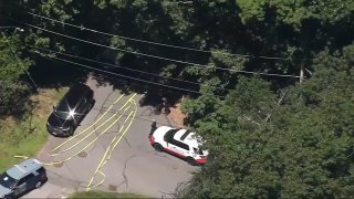 Police investigate a possibly incendiary device at a home on Rosebud Avenue in Haverhill, Massachusetts, on June 28, 2024.