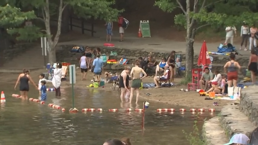 A crowded beach at the overflowing Walden Pond in Concord, Massachusetts, on Wednesday, June 26, 2024.