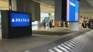 Delta Airlines monitors in Logan International Airport