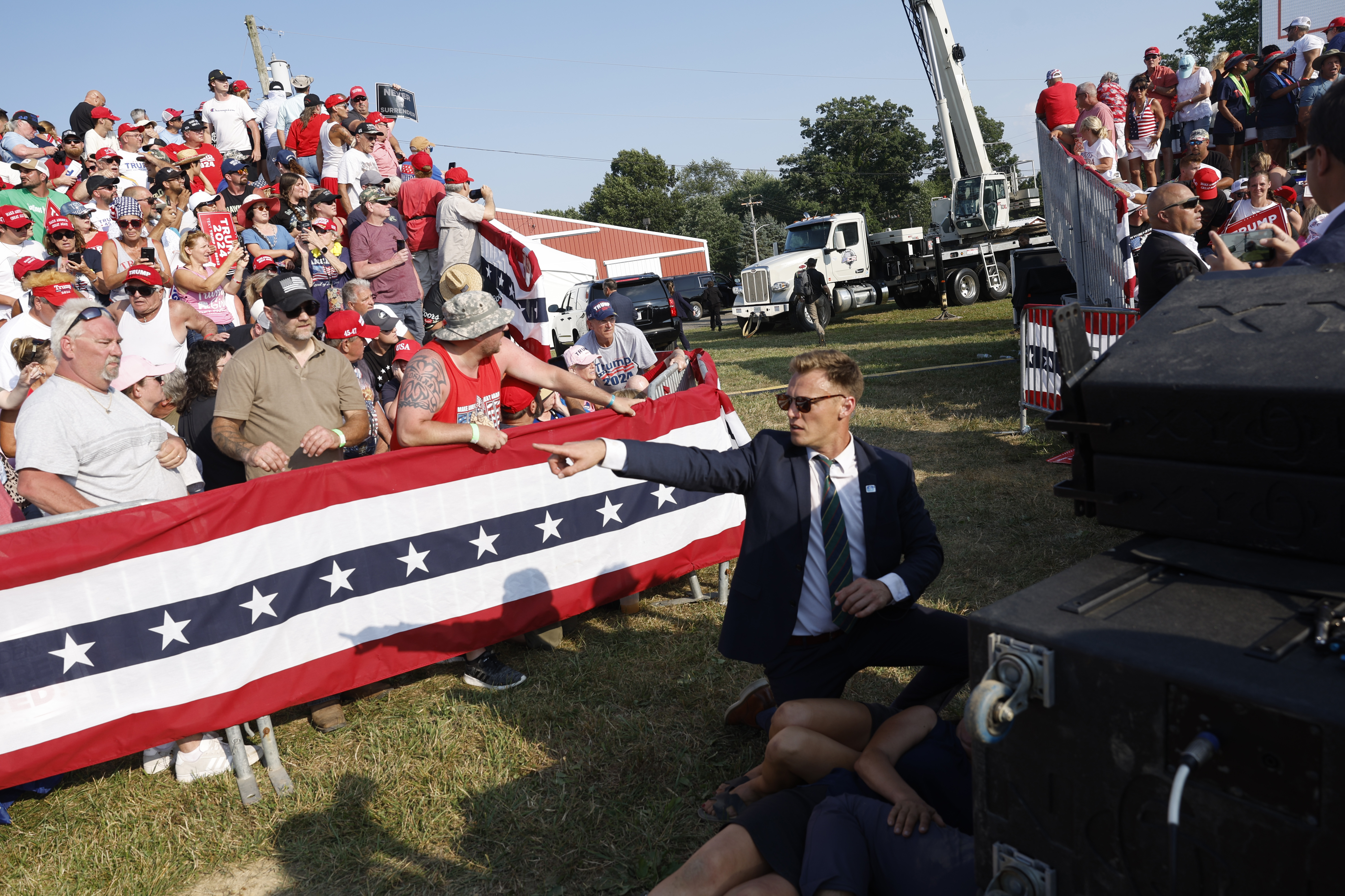 A Secret Service member and the crowd is seen at republican presidential candidate former President Donald Trump’s rally on July 13, 2024 in Butler, Pennsylvania.