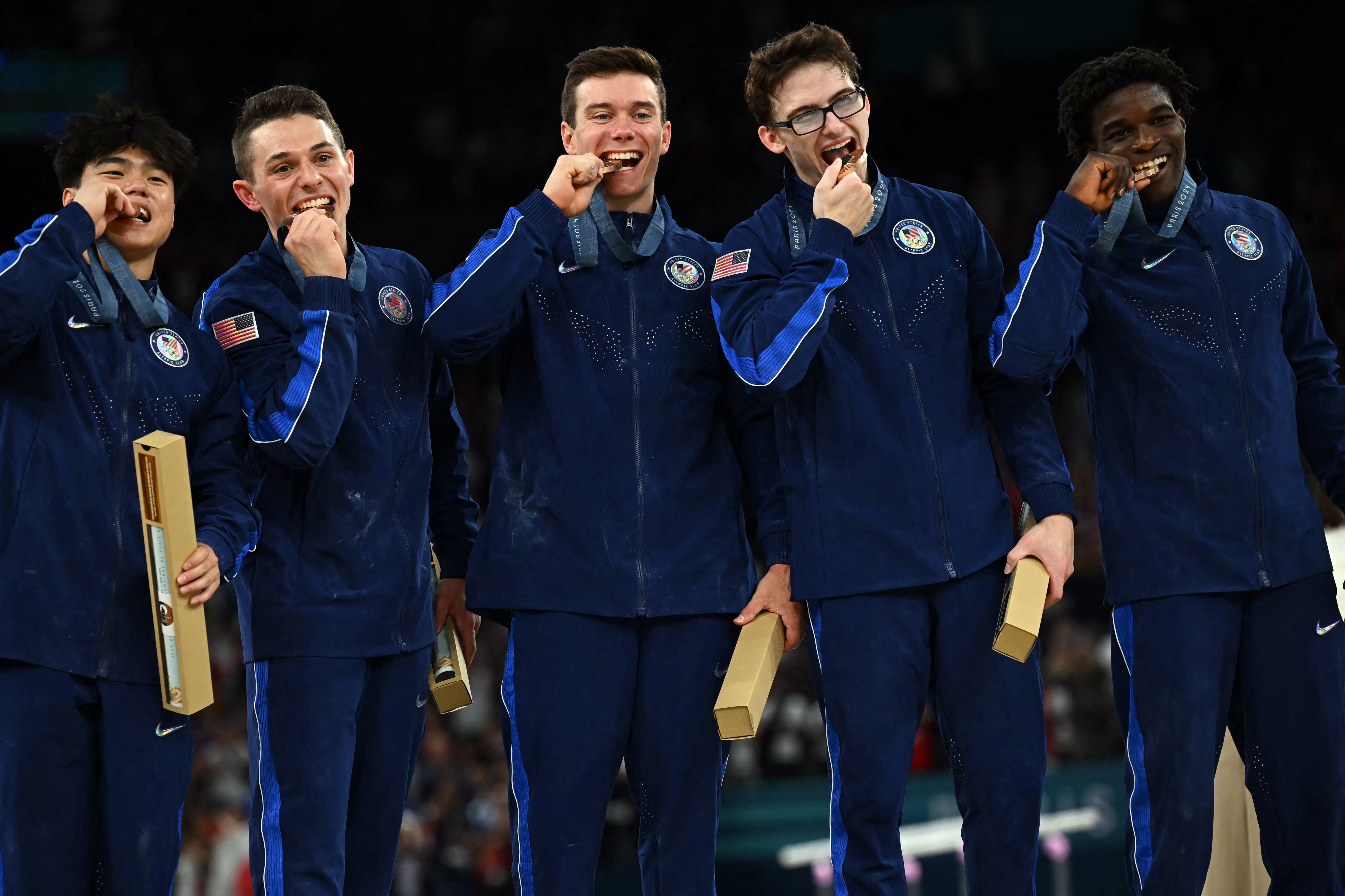 Team USA poses with their bronze medal during the podium ceremony for the artistic gymnastics men's team final