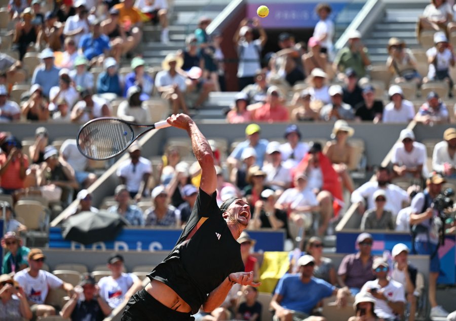 Germany's Alexander Zverev serves to Czech Republic's Tomas Machac